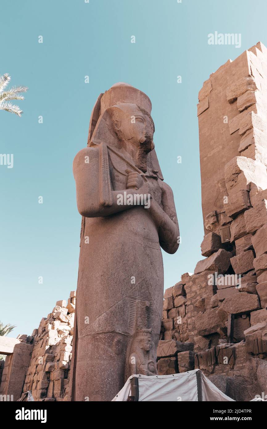 ancient statues of Egyptian pharaohs at Karnak Temple in Luxor Egypt