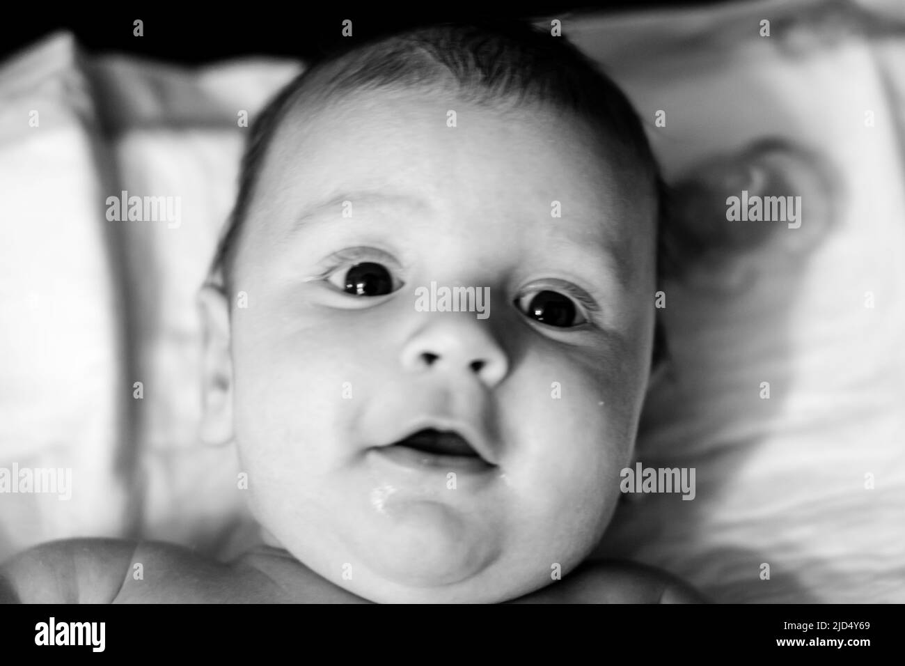 Sleeping newborn baby boy in bed. Newborn baby Stock Photo Alamy