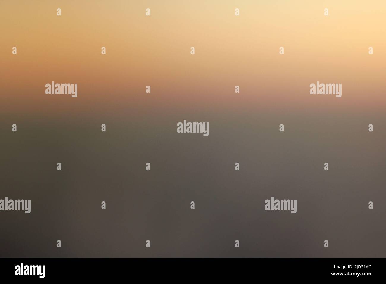 The glowing golden horizon of earth as seen thru the window of an