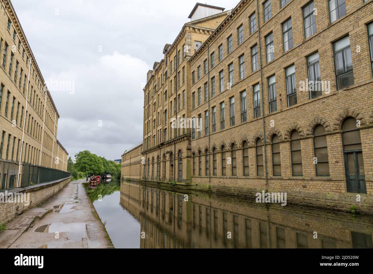Exterior view of Salts Mill and the Leeds & Liverpool canal, a former