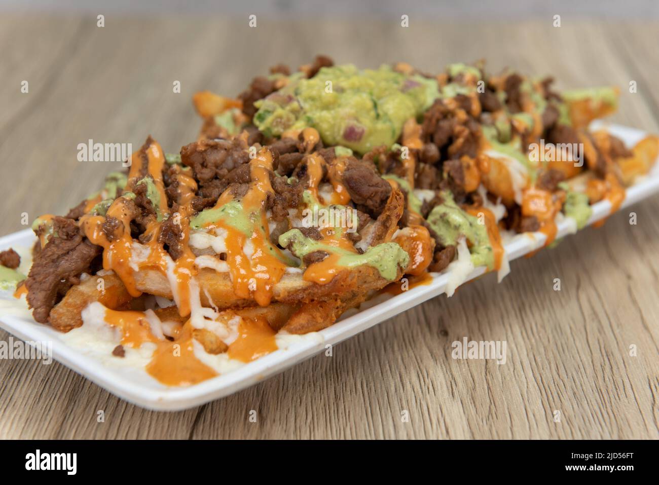 Appetizing carne asada steak french fries for a tempting Mexican food delicacy. Stock Photo