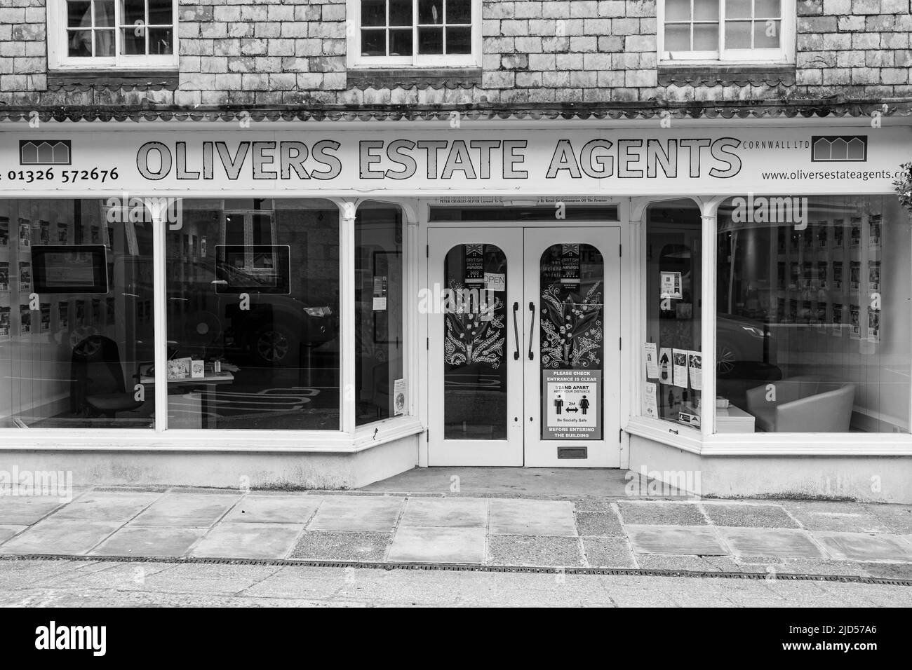 Retail outlets (Olivers estate agent) in Meneage Street, Helston