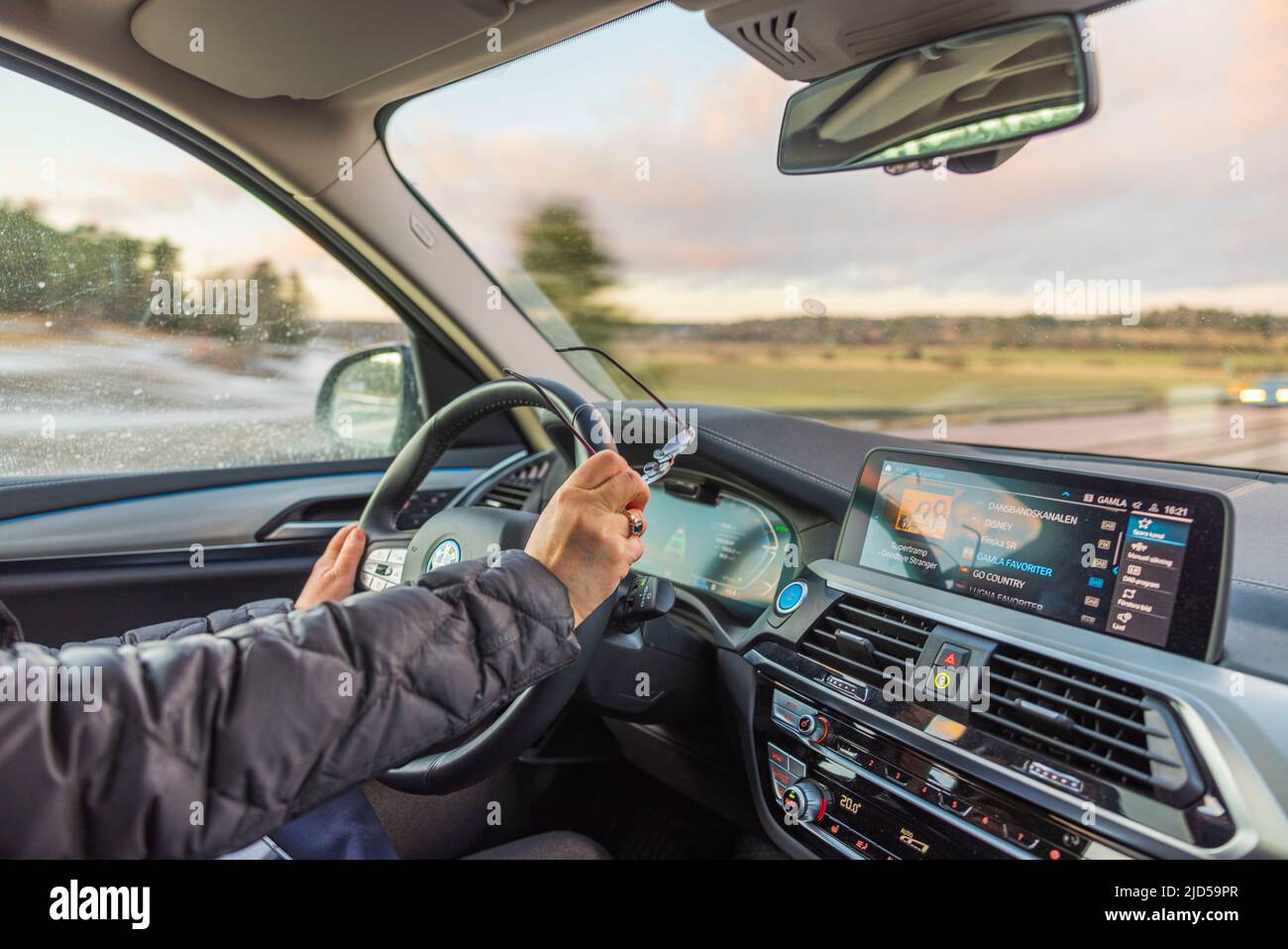 Womans hands on steering wheel hi-res stock photography and images - Alamy