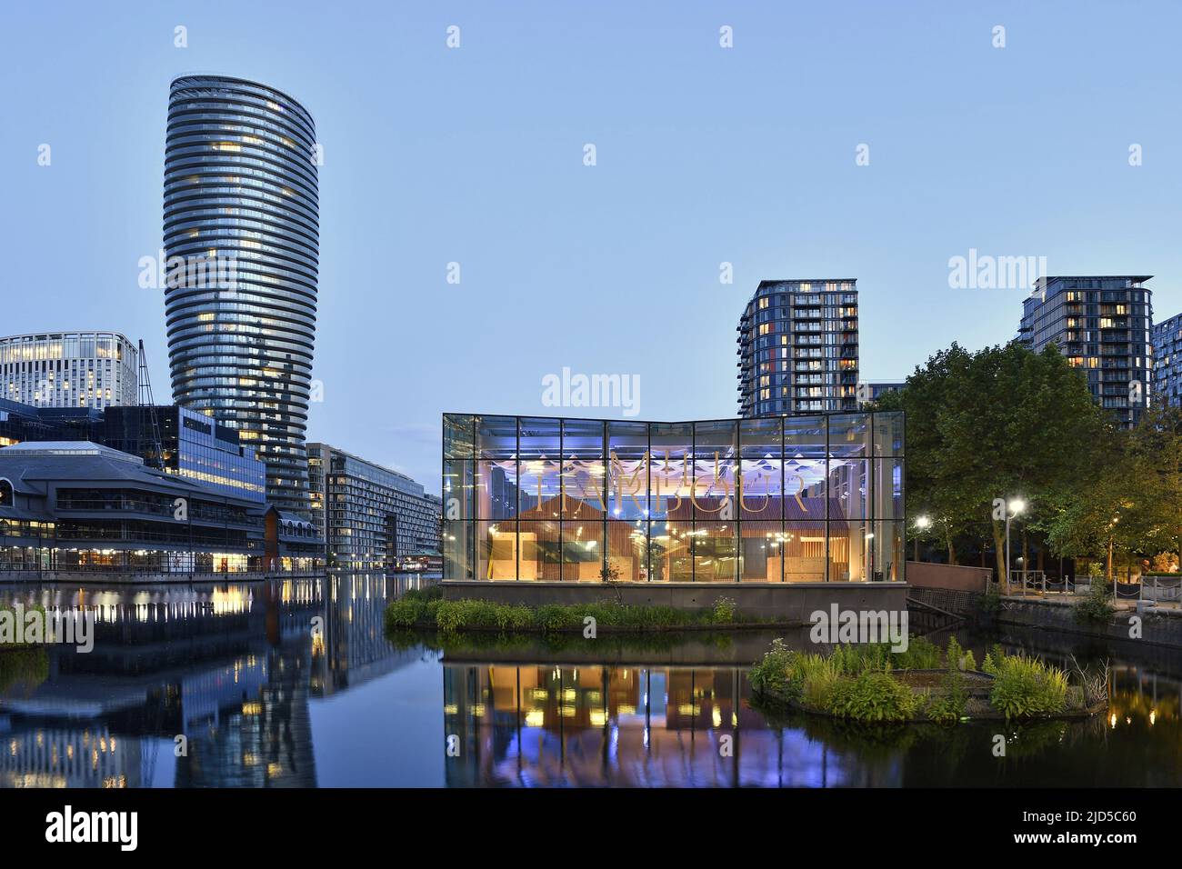 Harbour Exchange modern office buildings with Baltimore Tower residential skyscraper at dusk, located in Millwall east London UK. Stock Photo