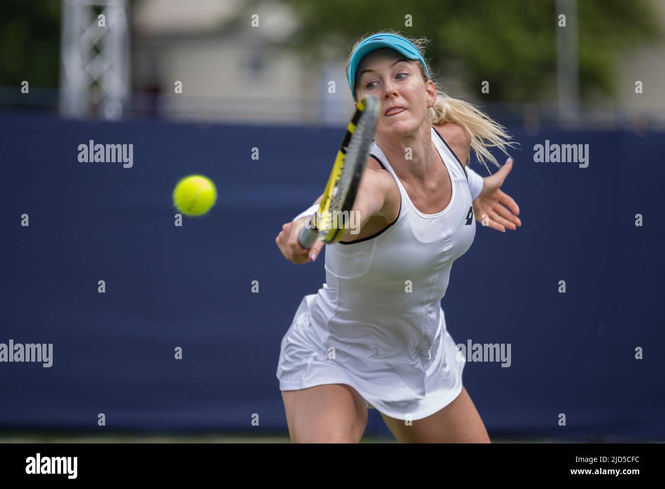 Urszula Radwanska of Poland playing a single handed backhand in her game with Heather Watson of Great Britain on Court 2 at Devonshire Park, Eastbourn Stock Photo