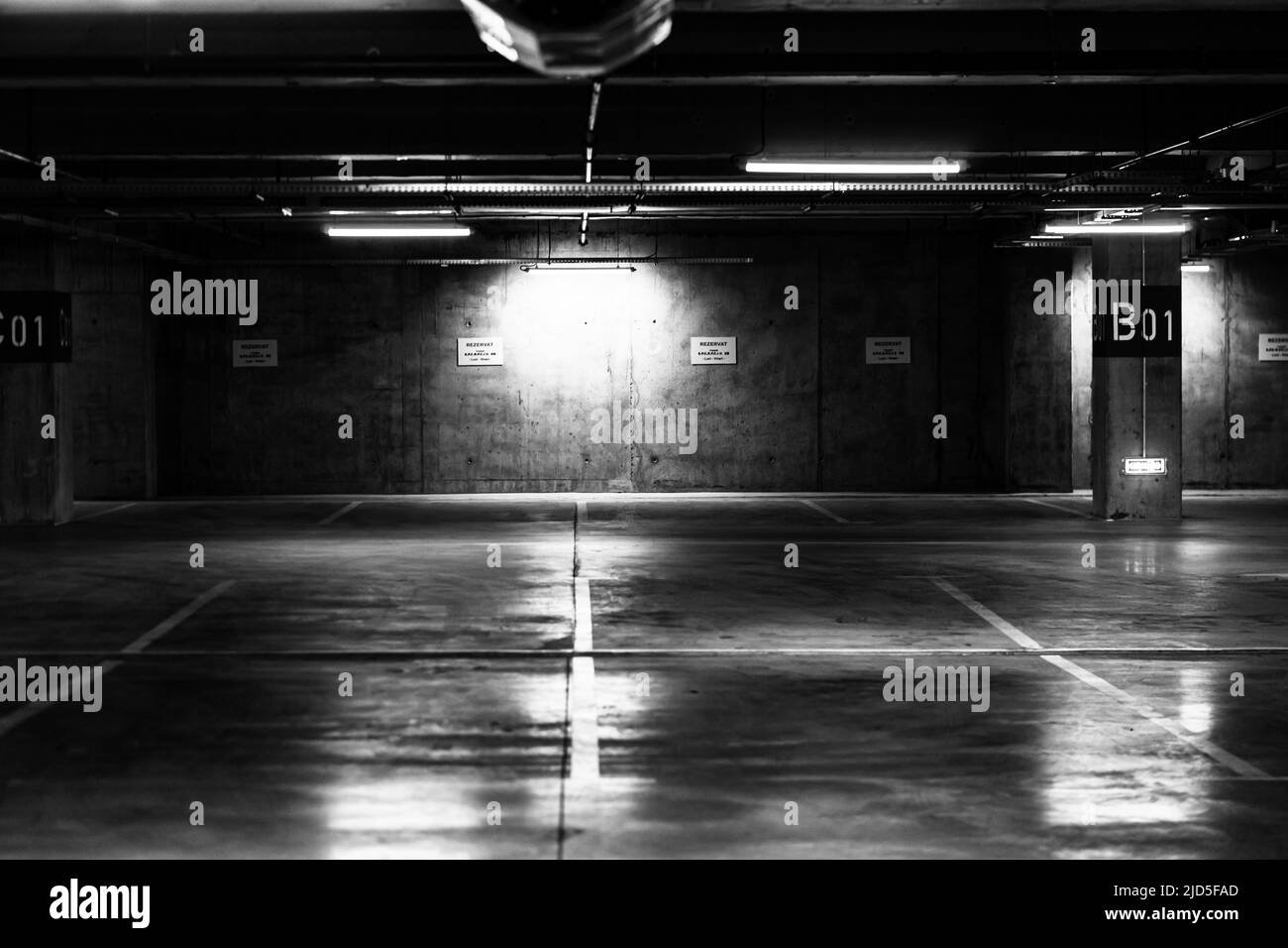 Empty parking lot at underground parking garage Stock Photo