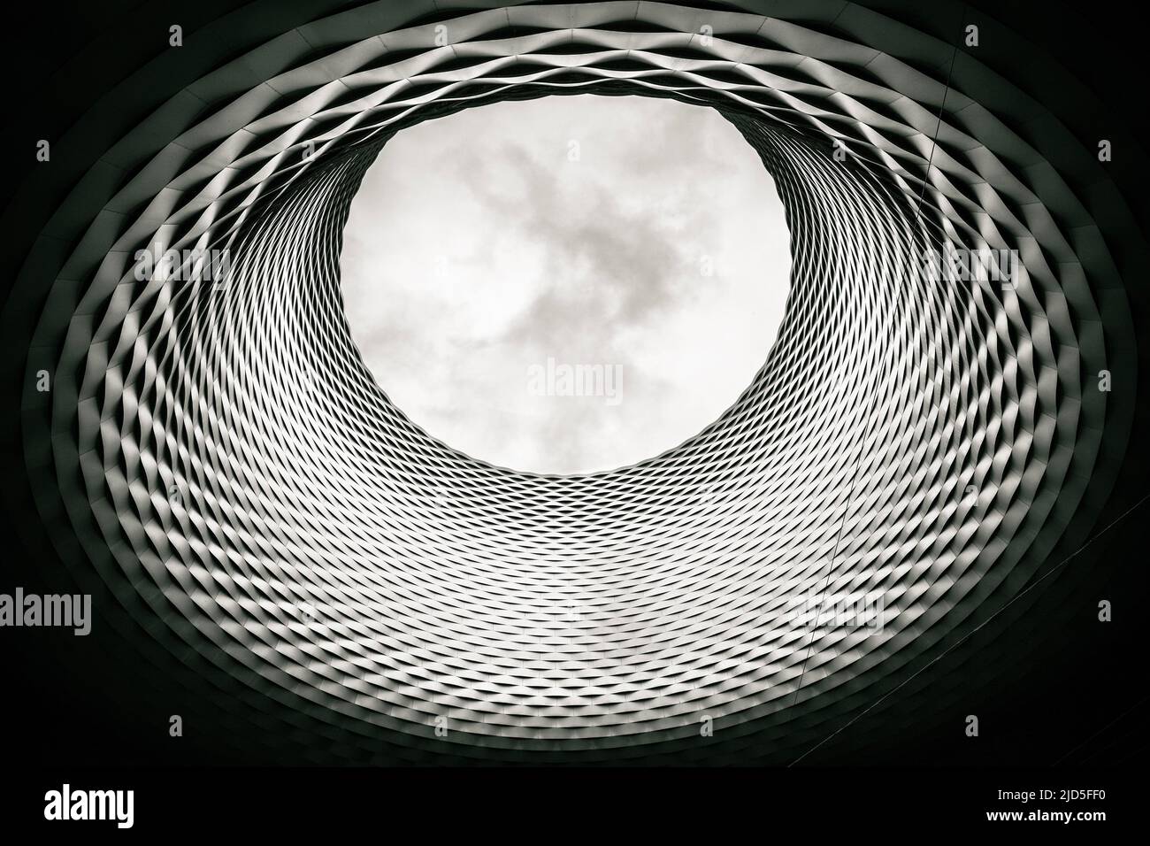 Basel Messe exhibition square aluminium panel facade hole black and white view, Switzerland Stock Photo