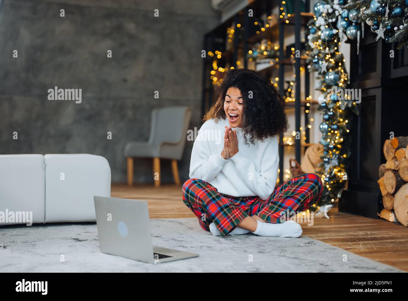 Beautiful young african american woman on the floor Stock Photo - Alamy