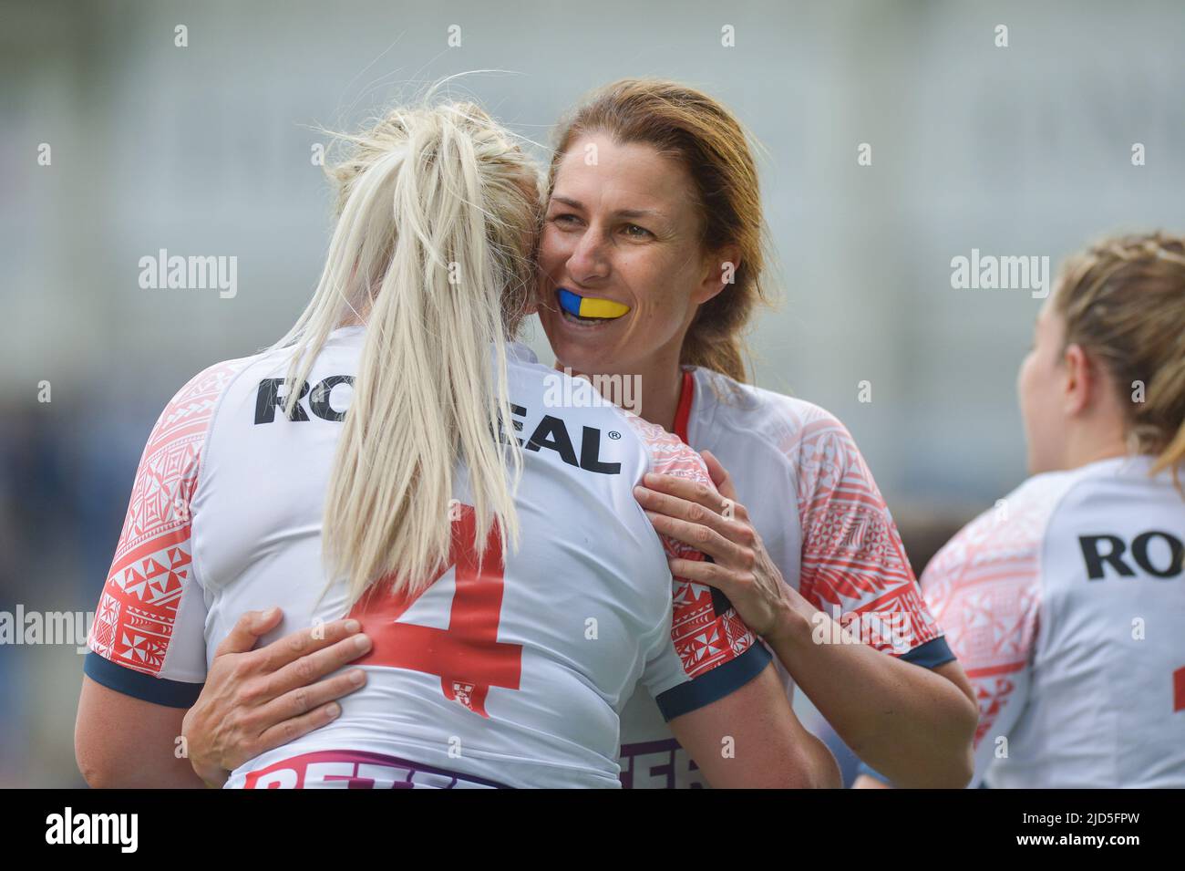 Warrington, England - 18th June 2022 - Amy Hardcastle of England  celebrates scoring a try with Courtney Winfield-Hill of England. Rugby League International England Woman vs France Woman at Halliwell Jones Stadium, Warrington, UK  Dean Williams Credit: Dean Williams/Alamy Live News Stock Photo
