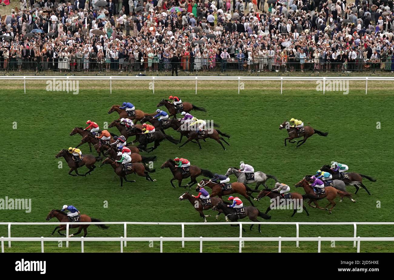 Naval Crown ridden by jockey James Doyle (left, bottom) wins the