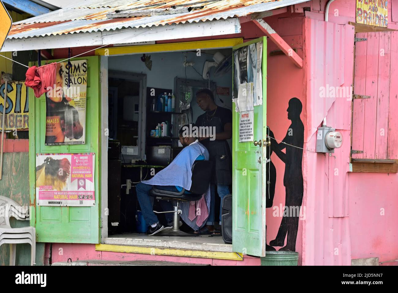BRIDGETOWN ,BARBADOS; February 19, 2020 A man in a local barber in the
