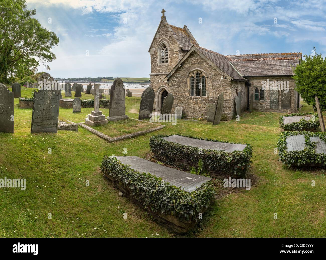 The ancient Norman chapel of St. Michael's in Porthilly, situated on the Camel estuary opposite Padstow, is one of two churches in the parish of St. M Stock Photo
