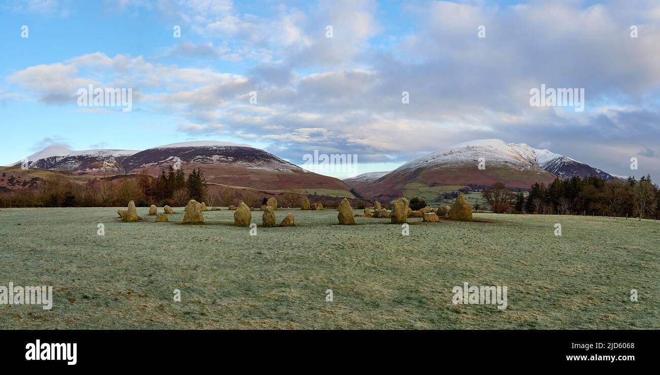 Castlerigg Stone Circle with snow capped Skiddaw and Blencathra in the distance. Stock Photo