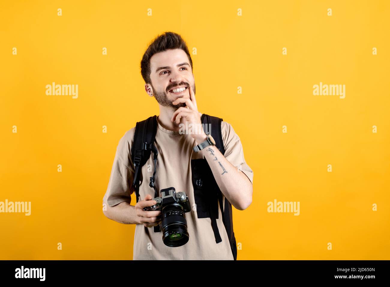 Man touching chin fingers hi-res stock photography and images - Alamy