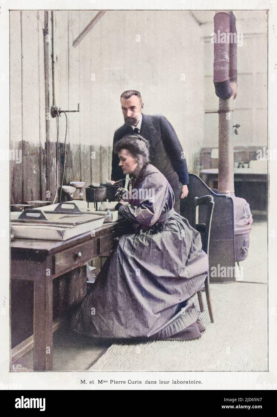 Marie and Pierre Curie in their laboratory, Paris Colourised version of : 10002518       Date: 1903 Stock Photo