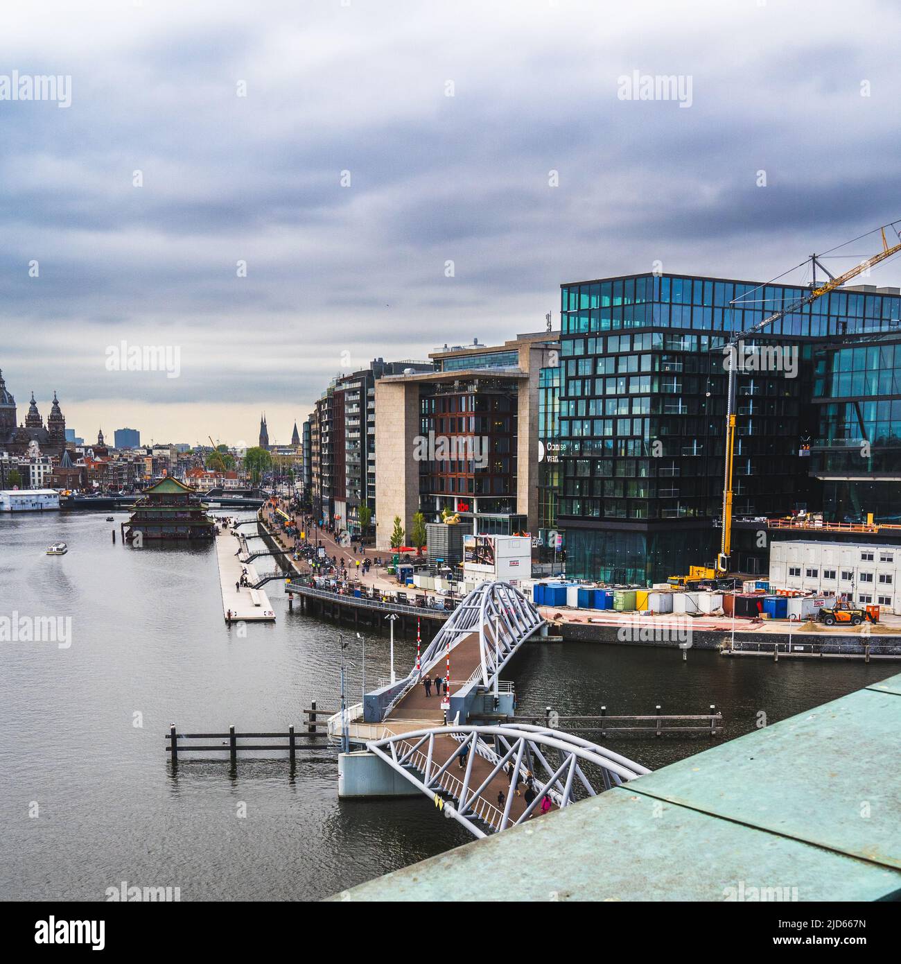 Modern building next to a river Stock Photo