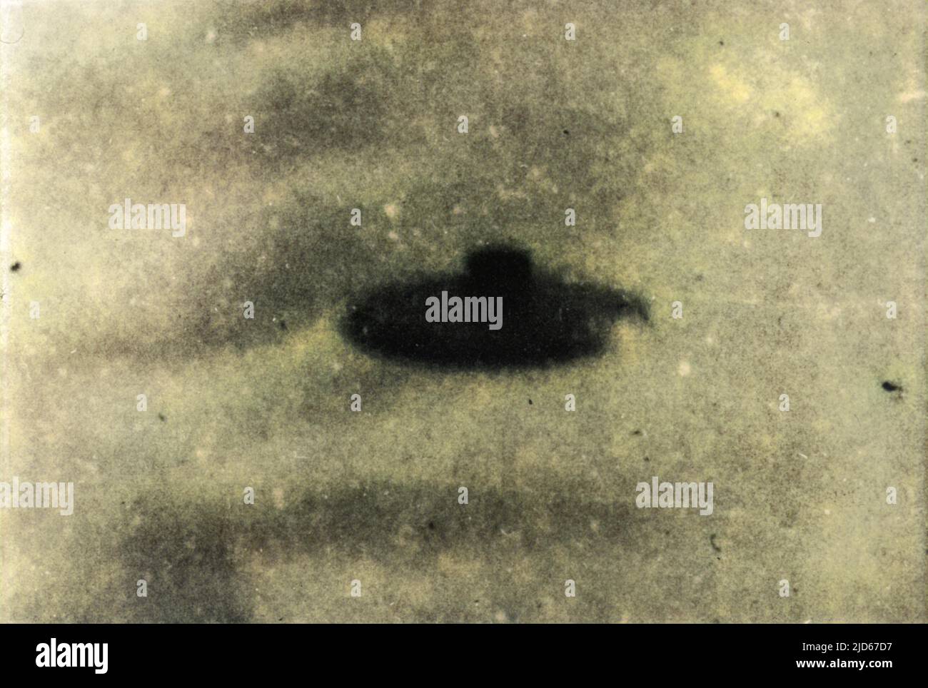 At Wall Township, New Jersey, 13-year old Robert J. Salvo, while walking his dog, sees this UFO and luckily happens to have his camera with him, so snaps it... Colourised version of : 10018418       Date: Mar-66 Stock Photo