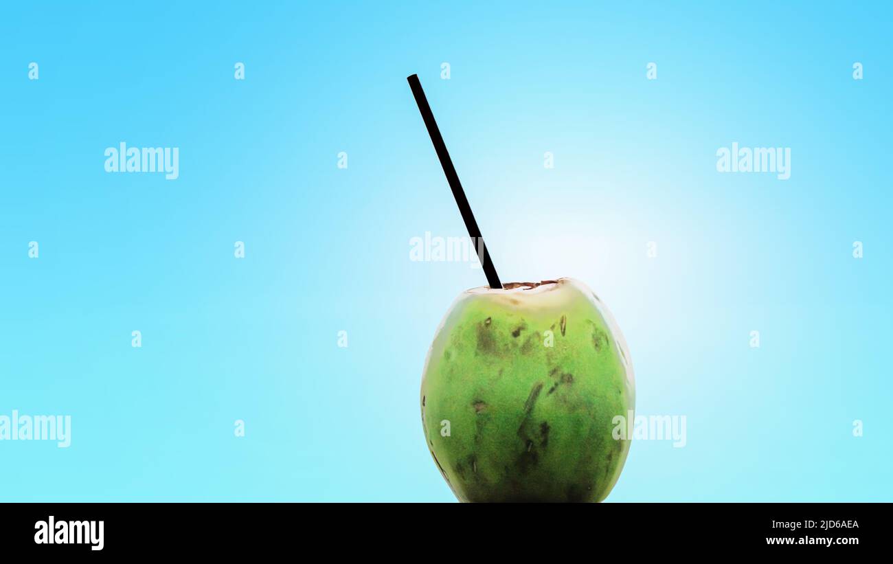 Coconut drink isolated on blue background. Stock Photo