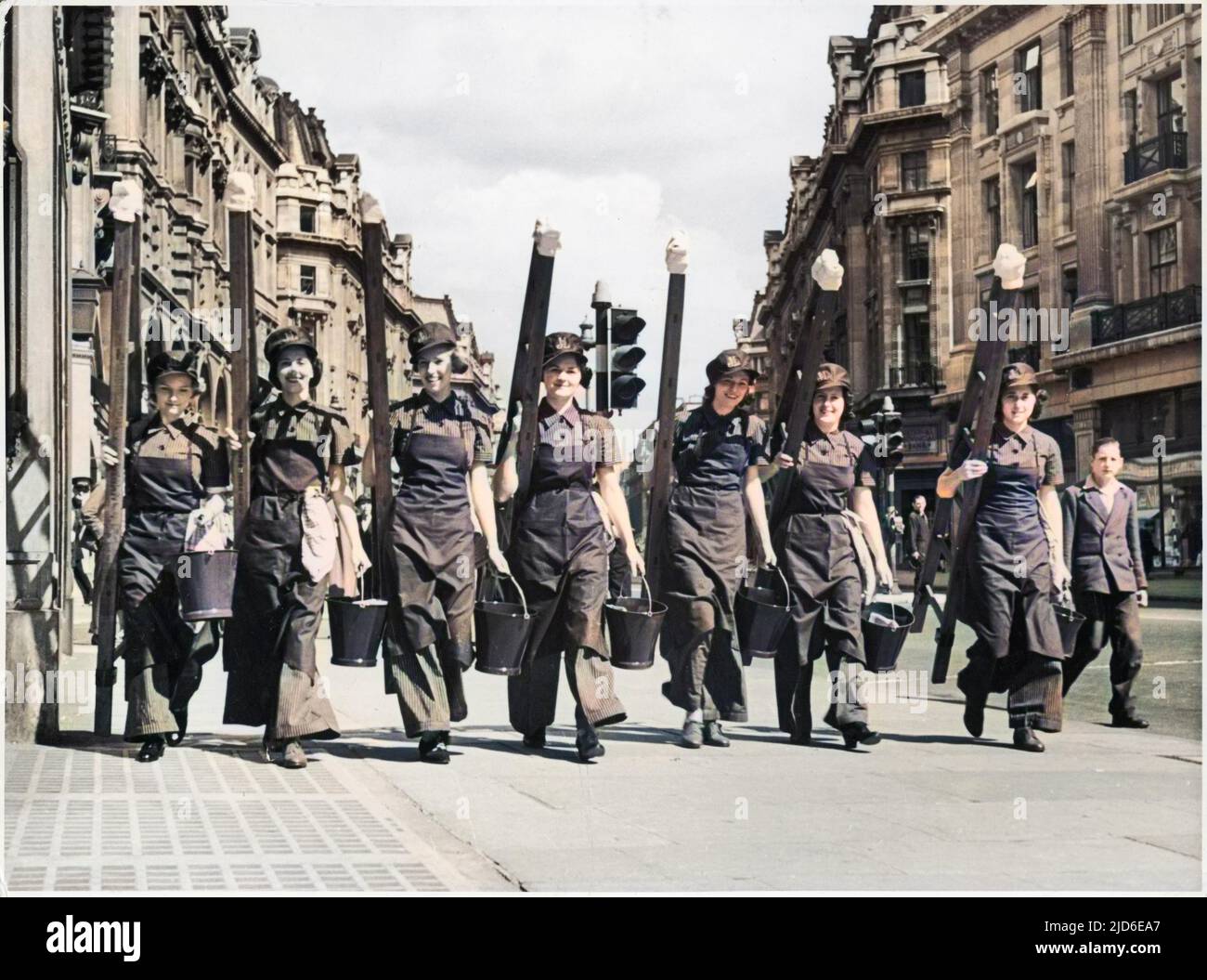 A group of newly trained set off for their first job, carrying their ladders and