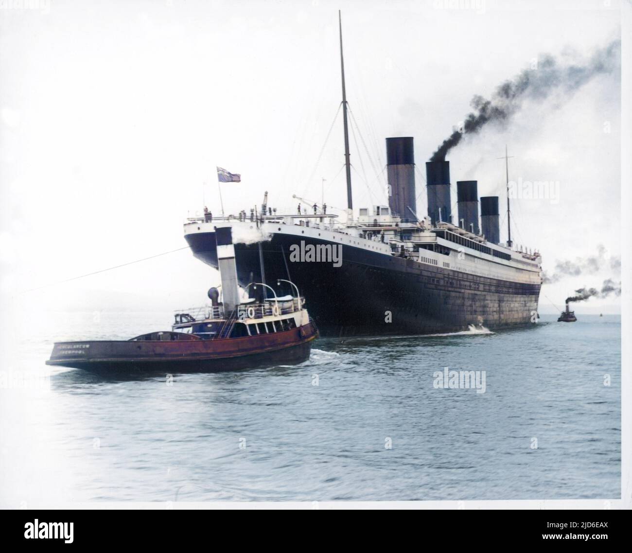 The Titanic leaving Belfast, Ireland, for Southampton, England for its maiden voyage New York, USA. It was built in Belfast 1909-1911, and fitted and furnished there 1911-1912. The photograph shows the stern of the ship. Colourised version of : 10140597       Date: 02-Apr-12 Stock Photo