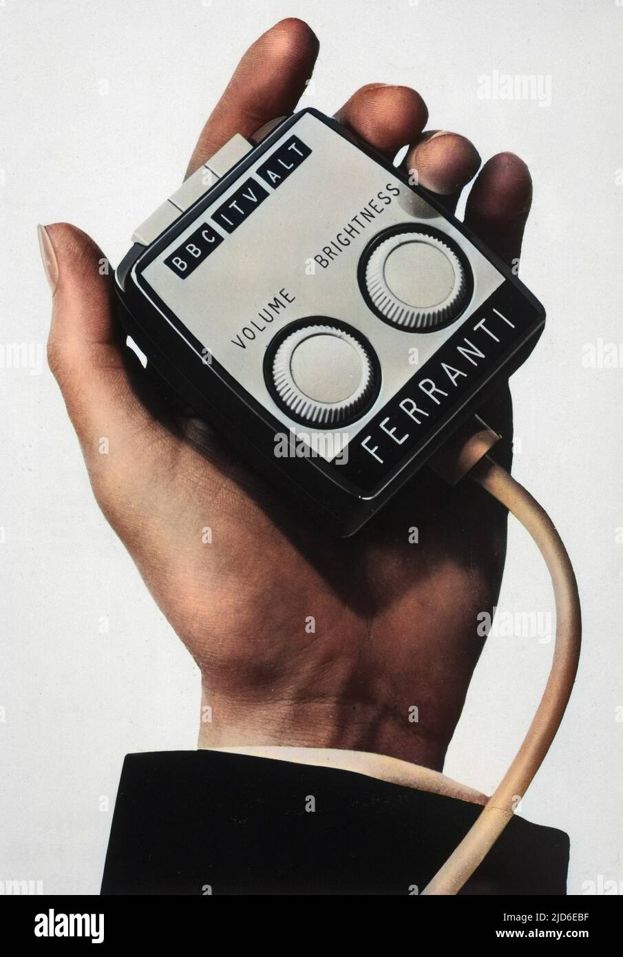 An early remote control, or an Armchair Programme Control. Manufactured by  Ferranti, this device came with 15 feet of cord which enabled the TV to be  operated from a distance. Colourised version