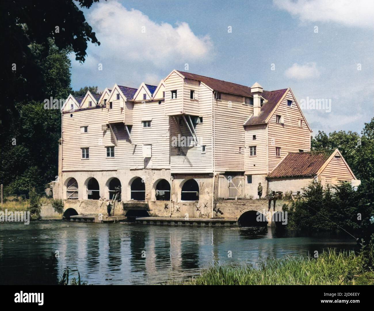 Horstead Watermill, on the River Bure, Norfolk, was one of the most beautiful weatherboarded wooden mills in England. Tragically destroyed by fire on 23 January 1963. Colourised version of : 10145945       Date: 1950s Stock Photo
