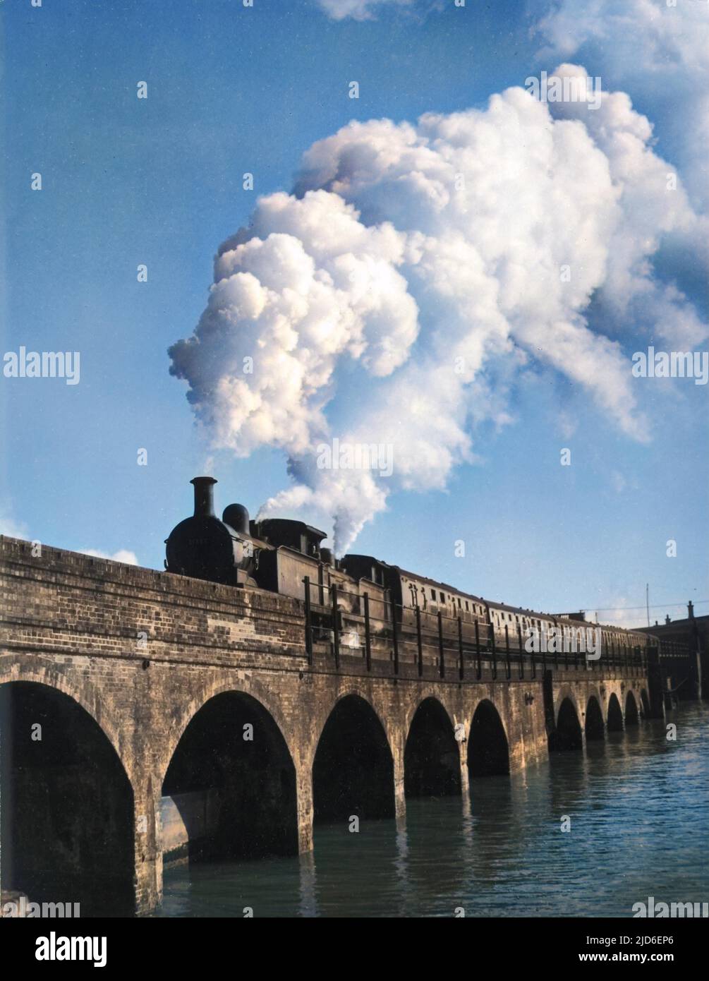 The Continental Boat Express Boat Express train on the viaduct at Folkestone, Kent, England, en route to Calais and Boulogne, France. Colourised version of : 10160726       Date: 1950s Stock Photo