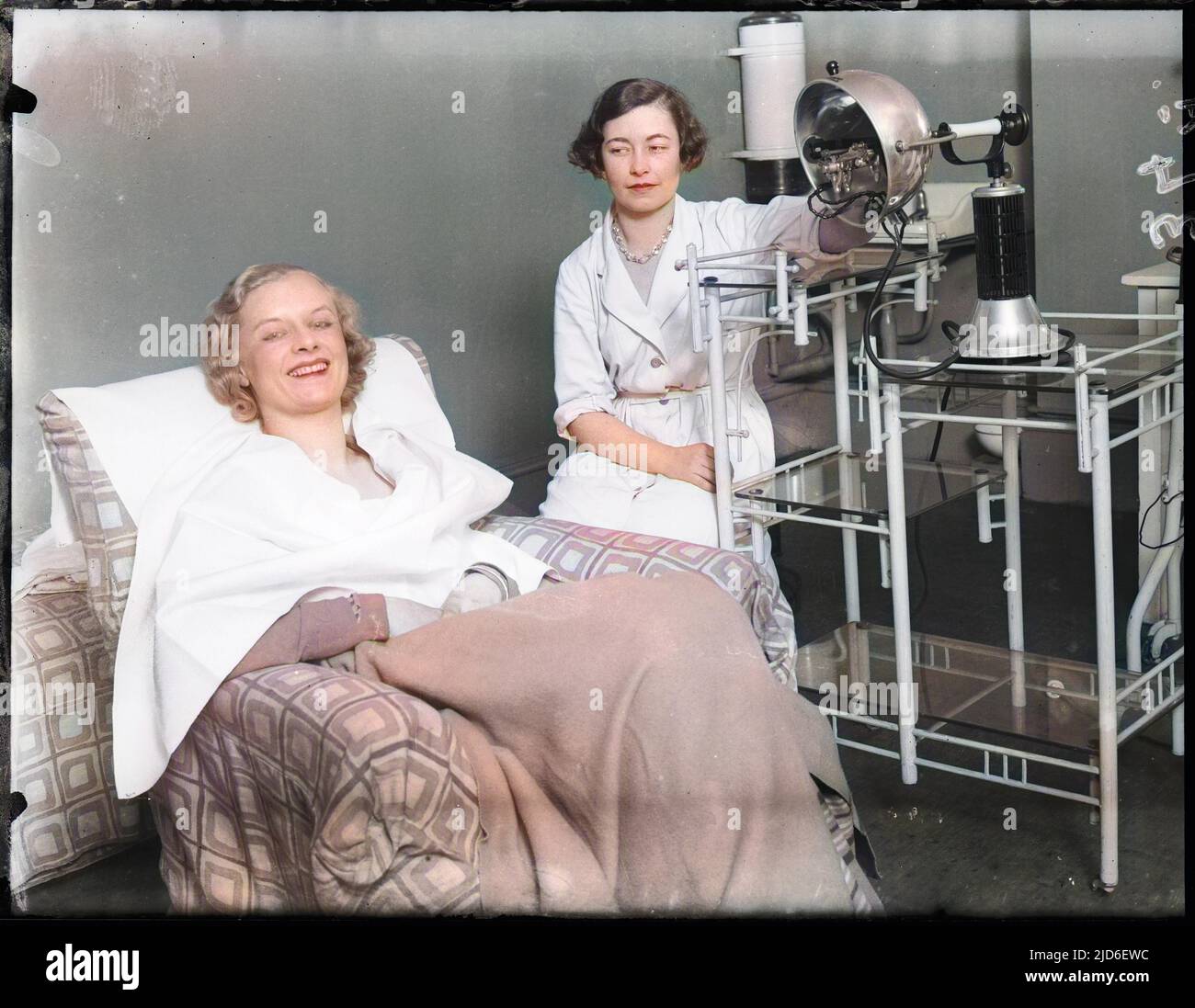 Beauty Queen Gwen Stallard, 'Miss England' for 1932 having a beauty treatment Colourised version of : 10161700       Date: 1932 Stock Photo