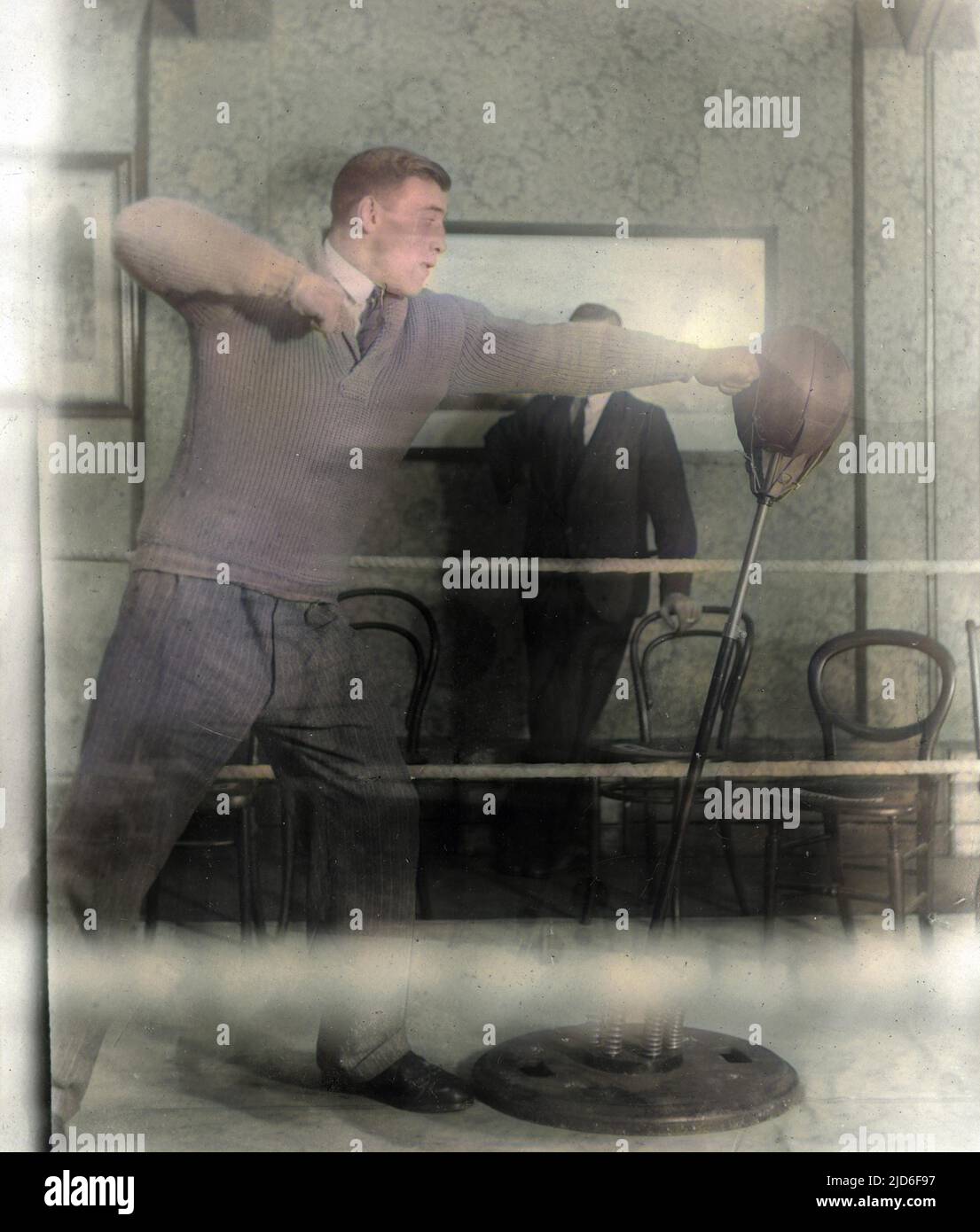 Italian boxer, Primo Carnera, World Heavyweight Champion 1933 1934. Here 'practising' whilst