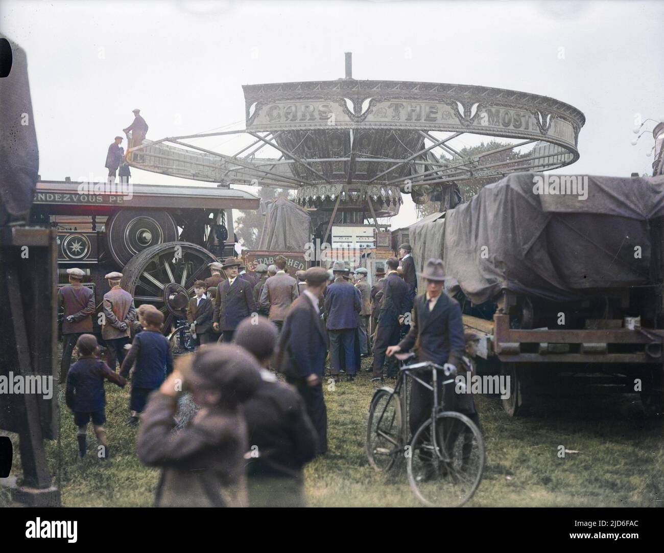 Workmen getting a carousel ready at Mitcham Fair, Surrey, England. Colourised version of : 10163802       Date: early 1930s Stock Photo