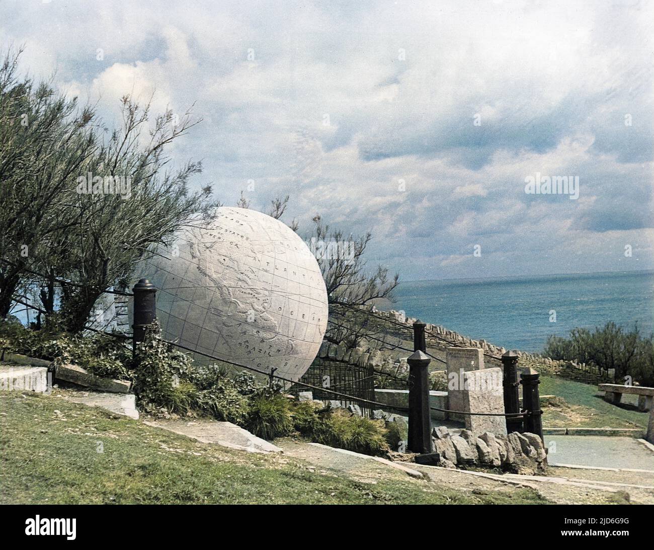 The Great Globe' at Durlston Head, near Swanage, Dorset, England. a remarkable large scale geographical sphere of the world, created for George Burt from Portland Stone. Colourised version of : 10173970       Date: 1887 Stock Photo