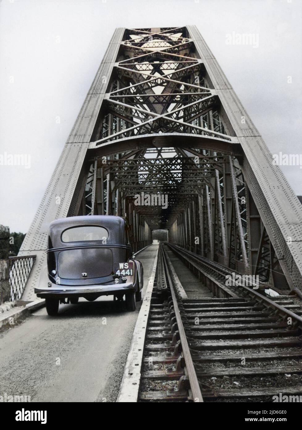 The Connel Ferry Bridge, the world's 2nd largest steel cantilever bridge, Argyllshire, Scotland, opened in 1903. The Ballachulish railway line closed in 1966. Colourised version of : 10174339       Date: 1950s Stock Photo