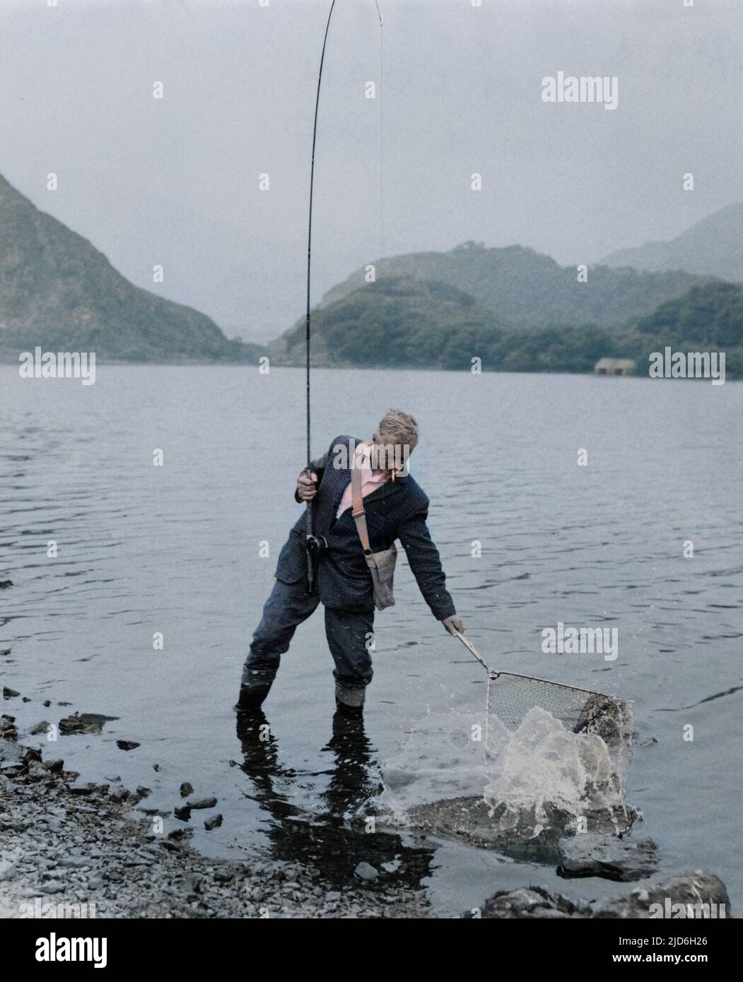 Salmon fishing on Lake Dinas, near Beddgelert, Wales. Colourised