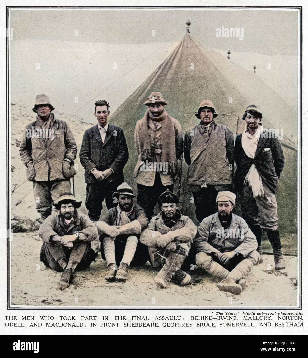 The 1924 Everest Expedition team in their camp. Those pictured are back row, left to right: Irvine, Mallory, Norton, Odell and MacDonald. Front row, left to right: Shebbeare, Geoffrey Bruce, Somervell and Beetham. Colourised version of: 10217924       Date: 1924 Stock Photo
