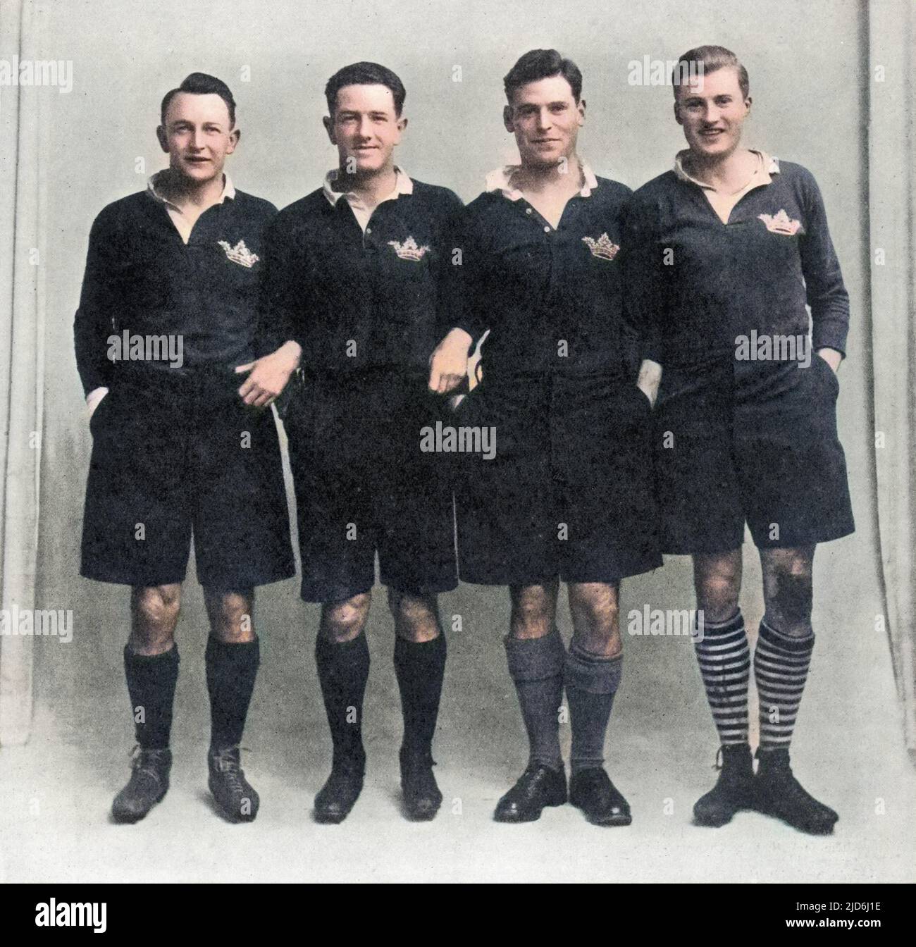 The Oxford University 'Scoring Machine': The Scottish rugby union three-quarter line, made up entirely of players from Oxford University, which contributed towards a Scottish grand slam in the Five Nations tournament of 1925. From left to right, A.C.Wallace, G.G.Aitken, G.P.S.Macpherson and I.S.Smith. Macpherson was unable to play in the fixture against Ireland in Dublin, due to an injury, and his place was taken by J.C.Dykes Colourised version of: 10409929       Date: 1925 Stock Photo