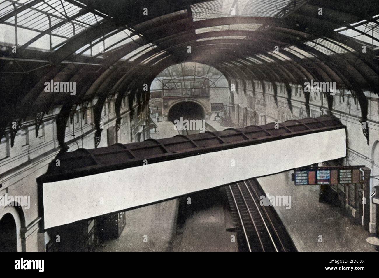 A conduit containing the overflow from the Serpentine running above the platforms at Sloane Square underground station. Colourised version of: 10528258       Date: 1909 Stock Photo