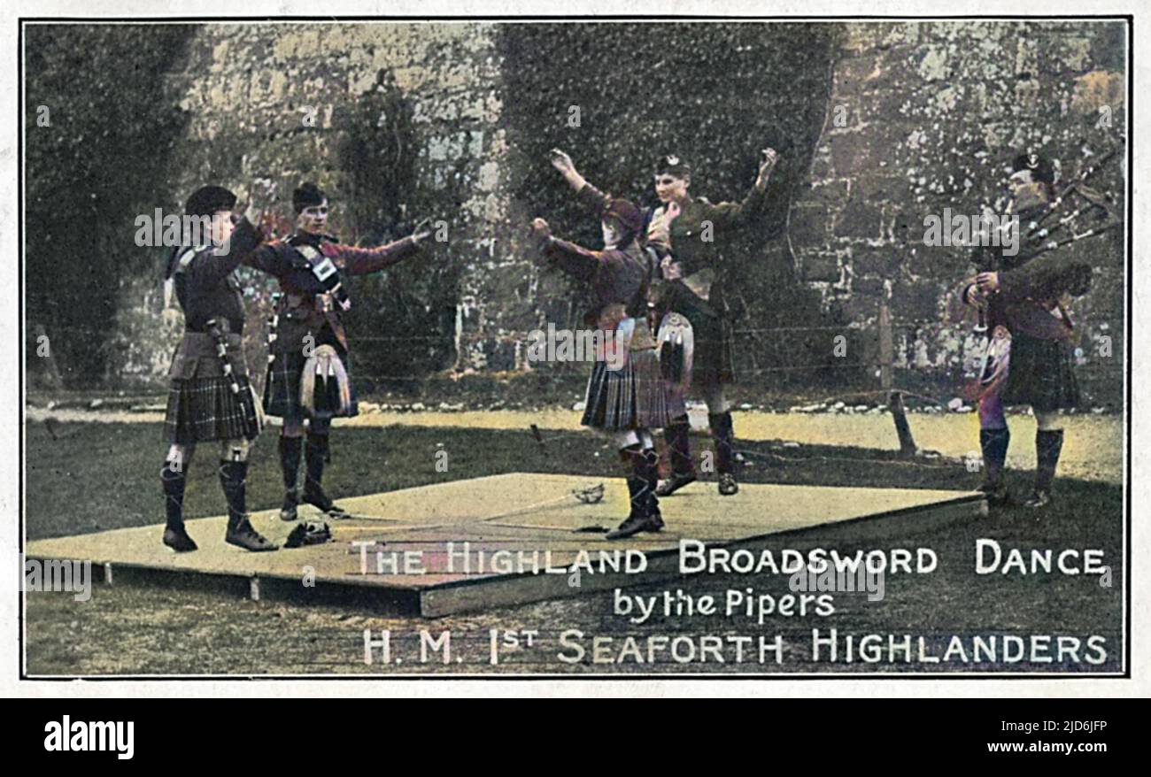 The Highland Broadsword Dance by the Pipers of HM 1st Seaforth Highlanders. Colourised version of: 10645539       Date: circa 1908 Stock Photo