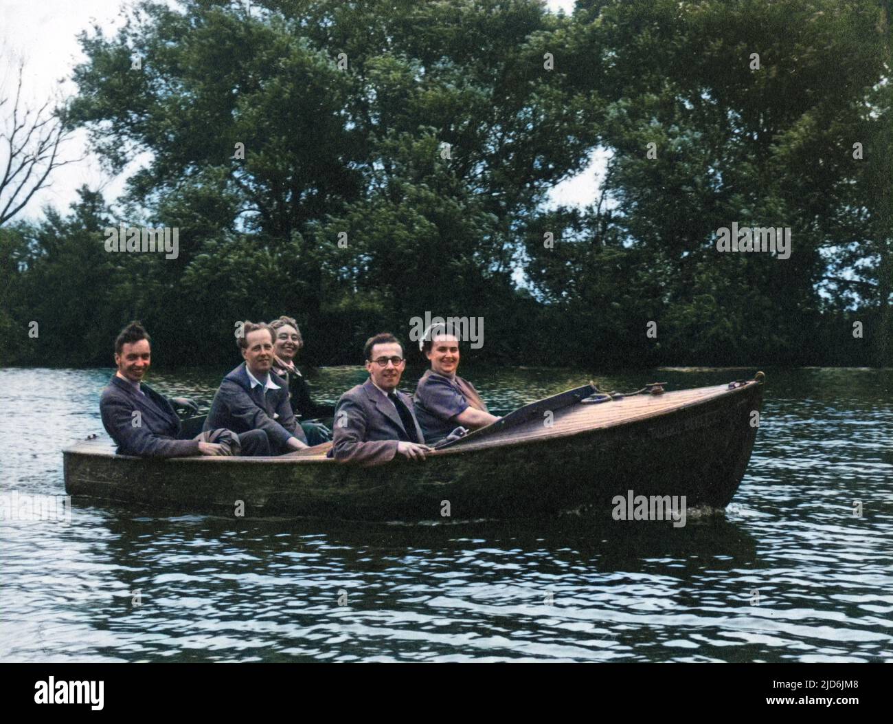 Five Friends in a very small motor launch ('The Bridge Belle 2') take a merry jaunt on the River Thames! Colourised version of: 10794446       Date: early 1950s Stock Photo