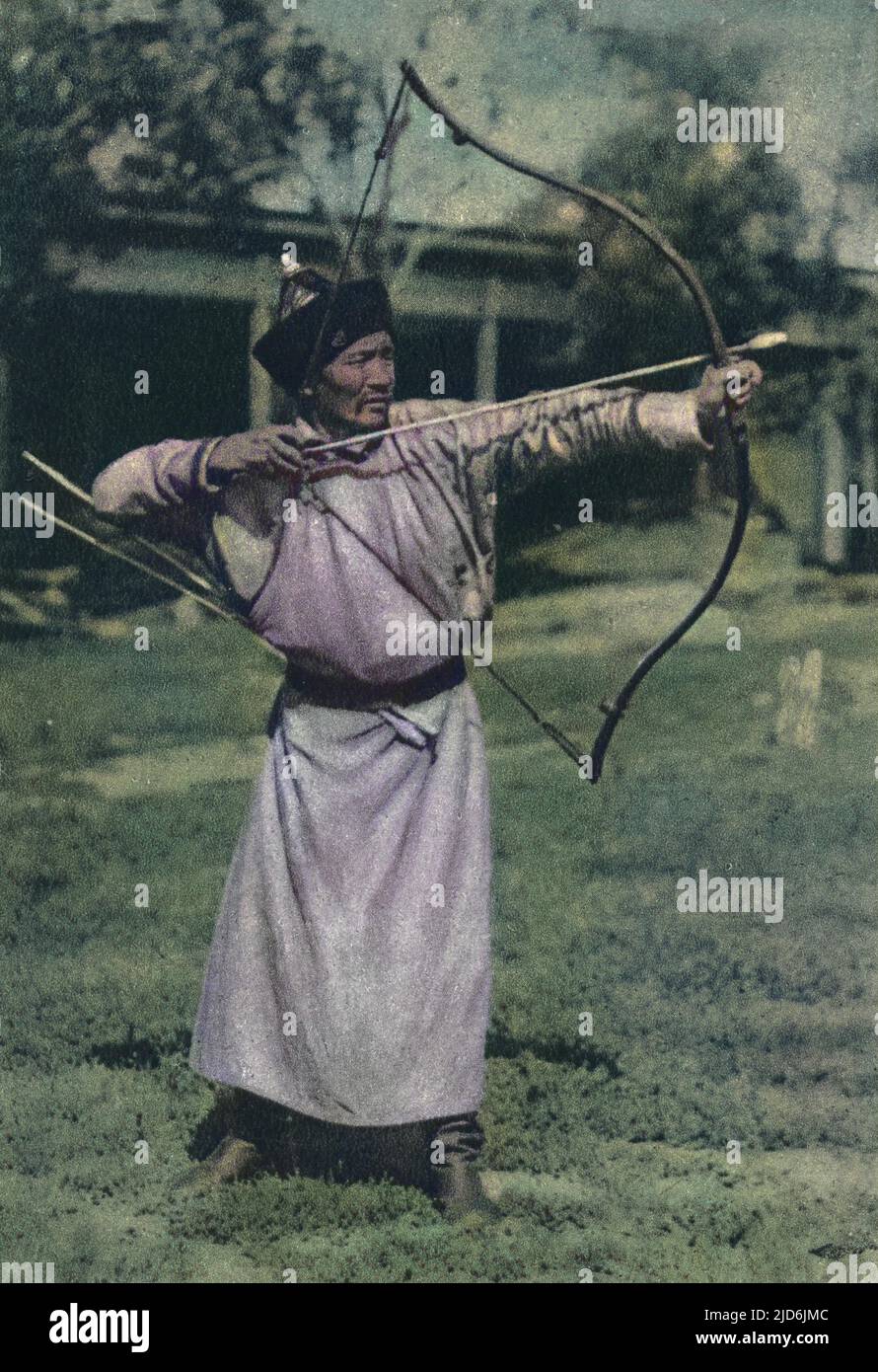 Buryat Archer competing at a Traditional Games in 1928. The Buryats or Buriyads - the largest indigenous (aboriginal) group in Siberia, mainly concentrated in their homeland, the Buryat Republic, a federal subject of Russia. They are the major northern subgroup of the Mongols. Colourised version of: 10644848       Date: circa 1910s Stock Photo