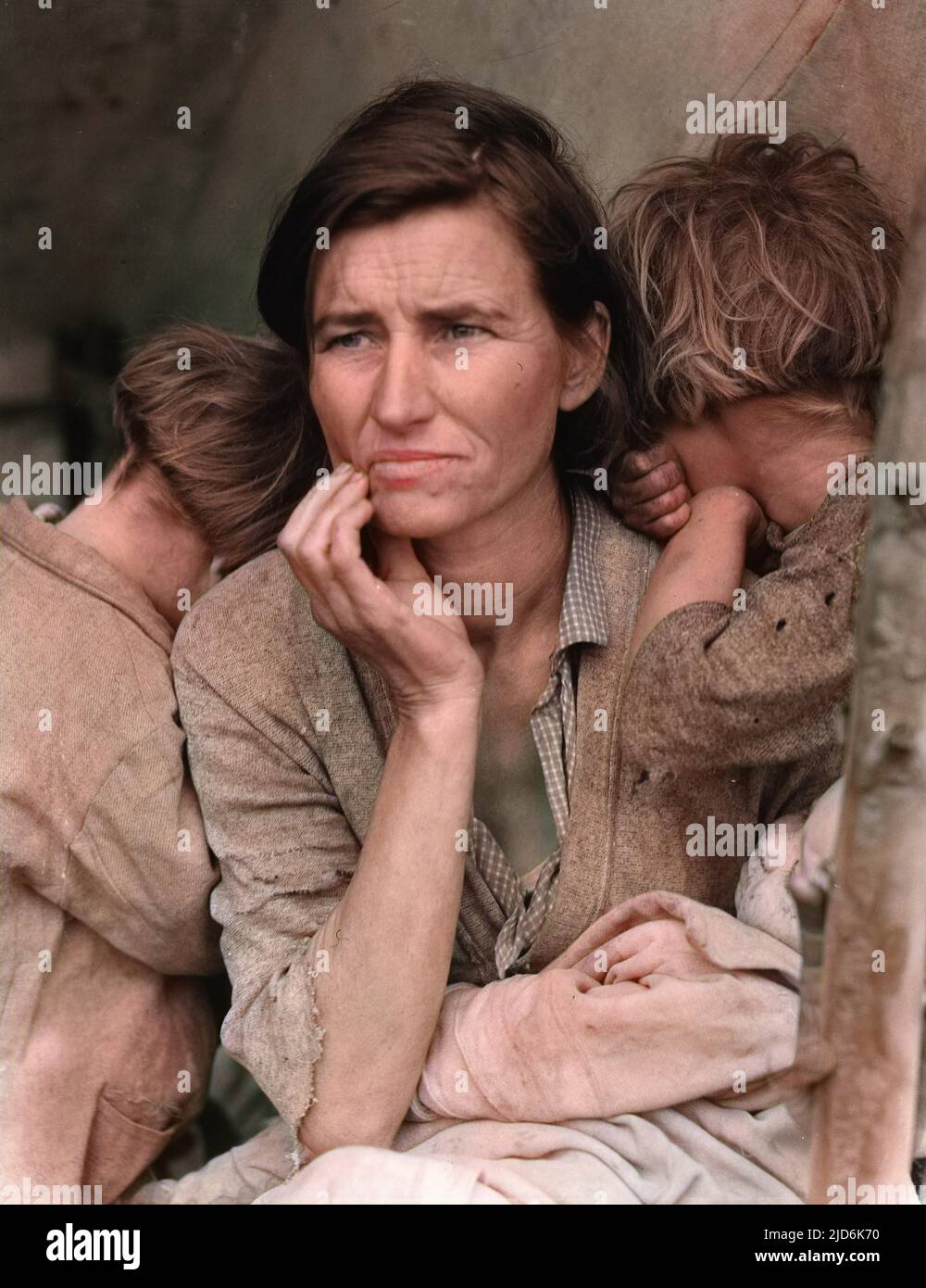 Destitute pea pickers in California. Mother of seven children. Age thirty-two. Nipomo, California. Photograph shows Florence Thompson with three of her children in a photograph known as Migrant Mother.  Destitute pea pickers in California. Mother of seven children. Age thirty-two. Nipomo, California. Photograph shows Florence Thompson with three of her children in a photograph known as Migrant Mother. Colourised version of: 10590660 Stock Photo