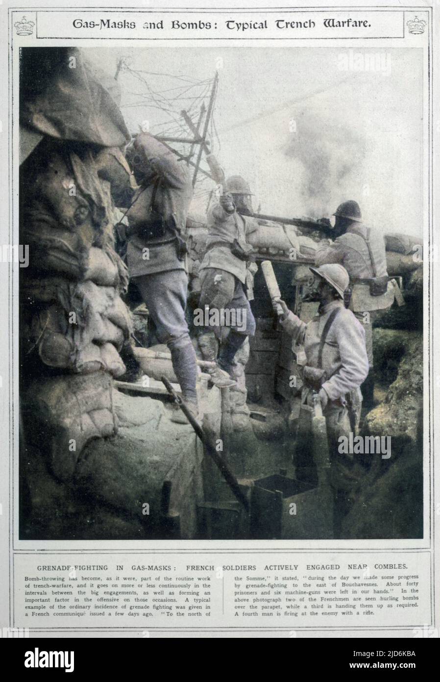 French soldiers throwing grenades while wearing gas masks during combat near Combles, France. Colourised version of: 10008100       Date: Oct-16 Stock Photo