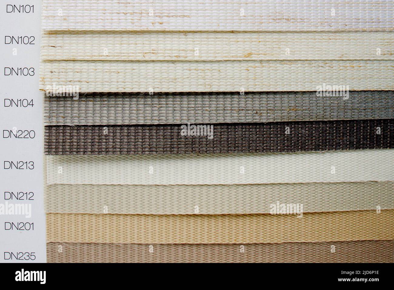 Samples of fabrics of different textures and colors in the form of a ...