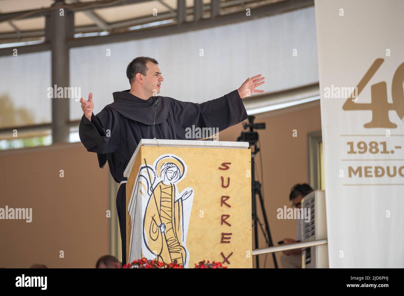 Fra Bojan Rizvan delivering a catechesis during Mladifest 2021 – the youth festival –  in Medjugorje. Stock Photo