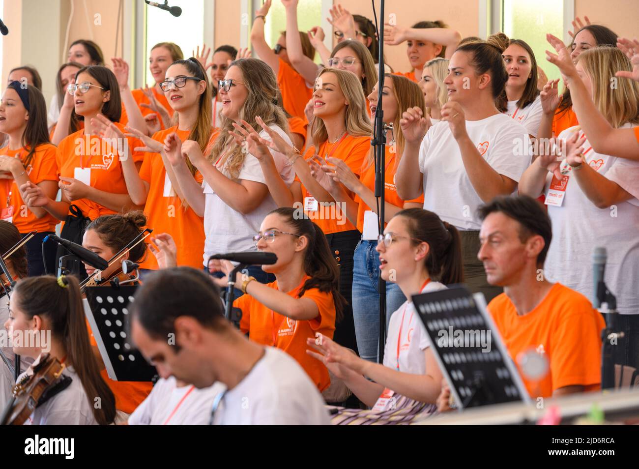 The choir of the Mladifest 2021 singing  – the youth festival in Medjugorje. Stock Photo