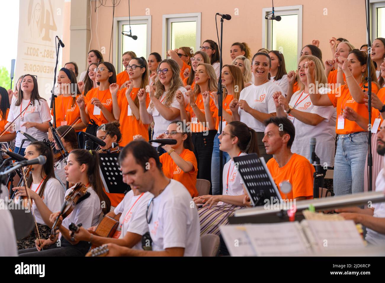 The choir of the Mladifest 2021 singing  – the youth festival in Medjugorje. Stock Photo