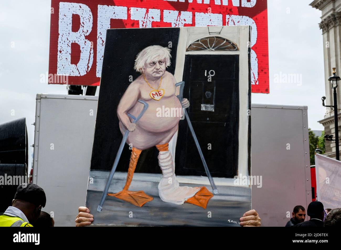 London UK, 18th May 2022. Thousands of trade union members march on the We Demand Better protest organised by the TUC against the UK government and the cost of living crisis. A caricature of Prime Minister Boris Johnson depicted as a lame duck displayed on the route of the march in Whitehall. Stock Photo