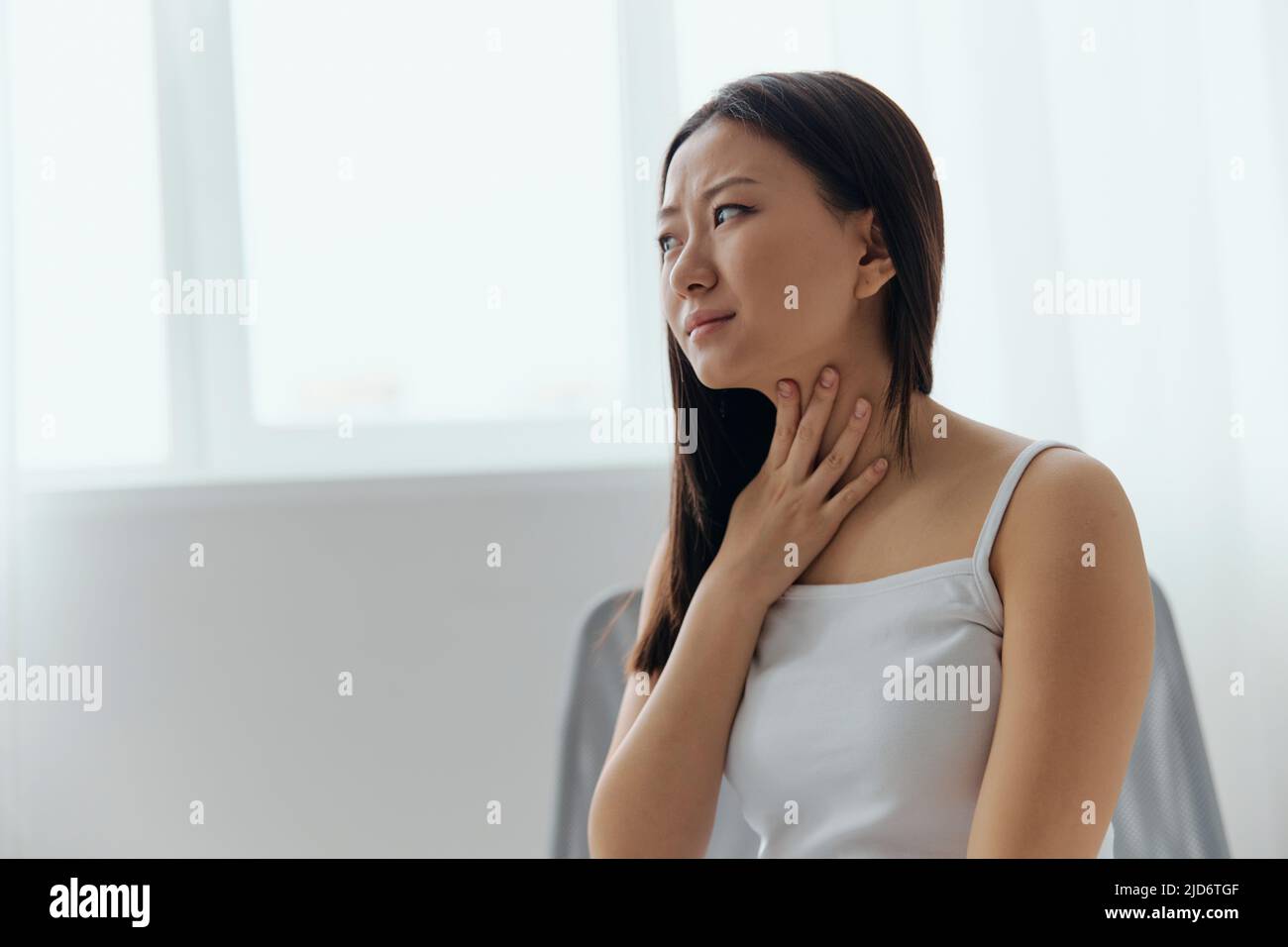 Cough Tickling. Portrait of suffering crying tanned beautiful young