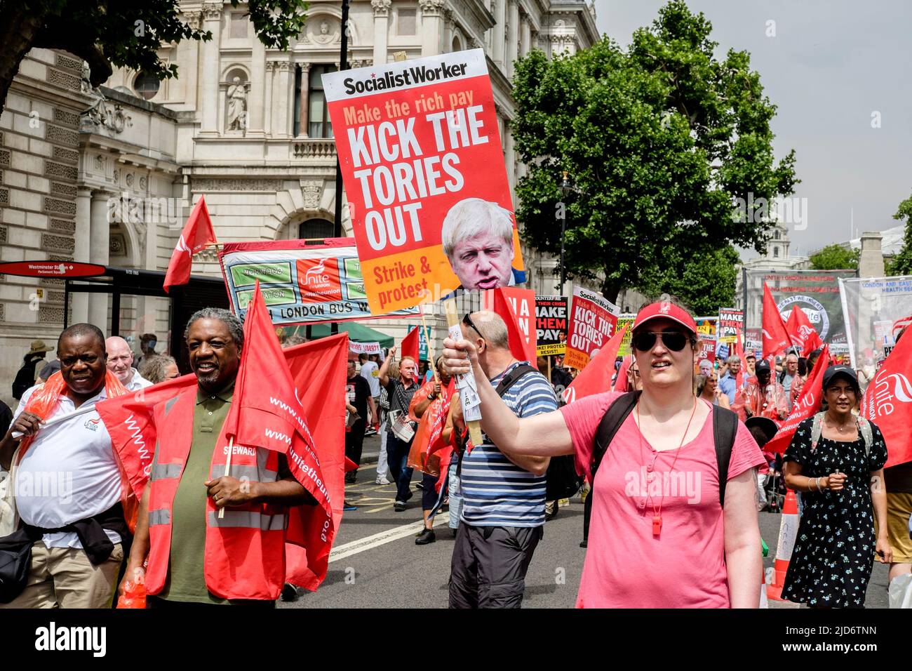 London UK, 18th May 2022. Thousands of trade union members march on the We Demand Better protest organised by the TUC against the UK government and the cost of living crisis. Anti-government placards on display throughout the protest. Stock Photo