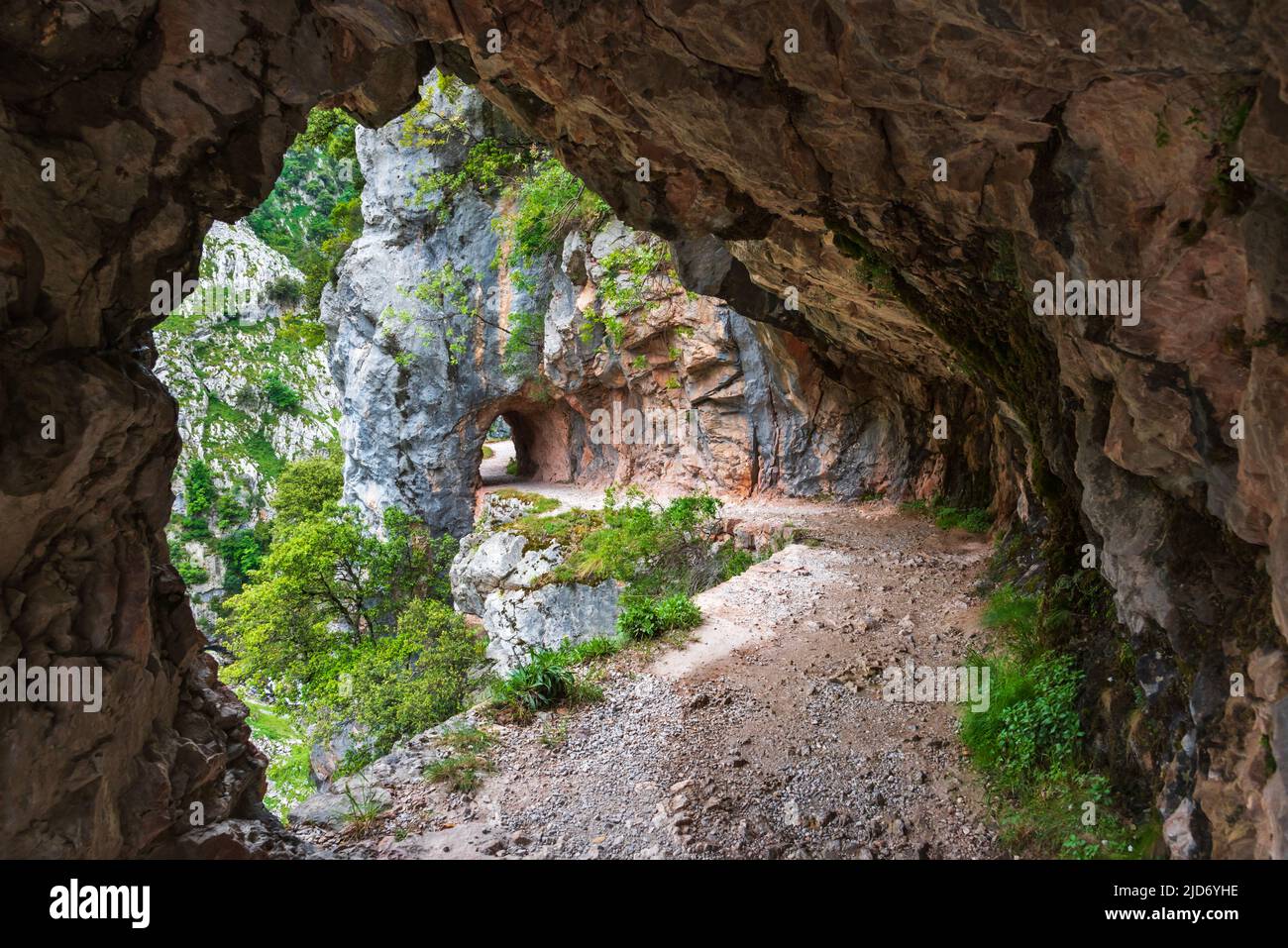 Tunnels excavated in the rock on the Cares river path. Stock Photo
