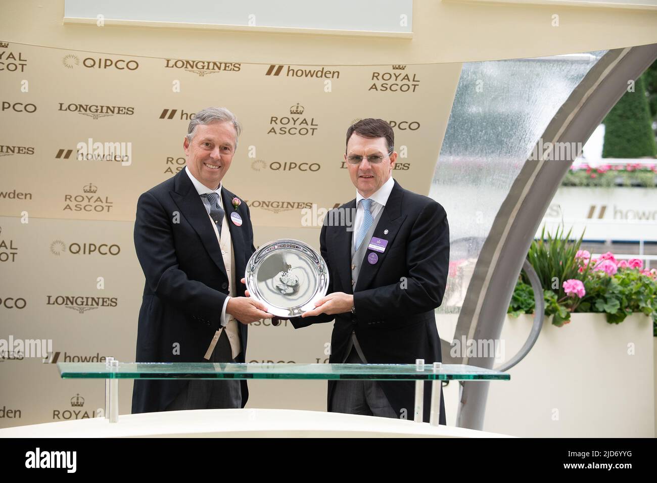 Ascot, Berkshire, UK. 18th June, 2022. Trainer Aidan O'Brien (right) was awarded a prize for the leading trainer at this year's Royal Ascot by Ascot's Guy Henderson. Credit: Maureen McLean/Alamy Live News Stock Photo